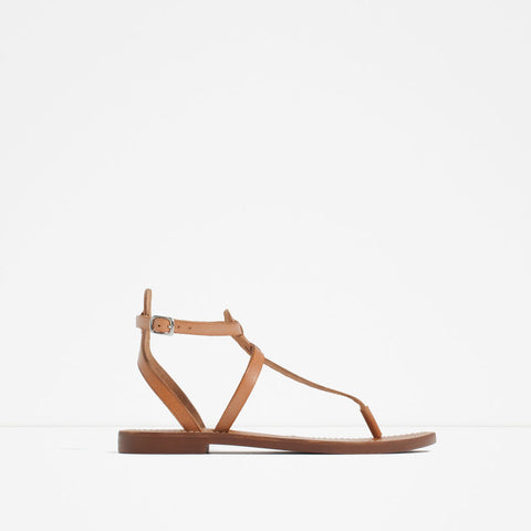 FLAT LEATHER CROSSOVER SANDALS