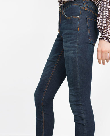 MID-RISE SKINNY JEANS